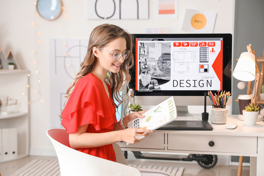 Female interior designer working in office