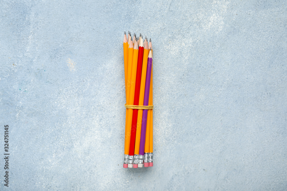 Ordinary pencils on color background