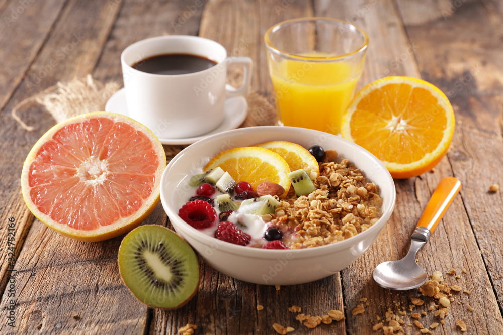healthy breakfast with muesli and fruit, coffee cup and orange juice - obrazy, fototapety, plakaty 
