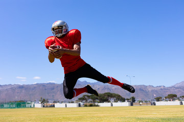 Wall Mural - Football player playing football