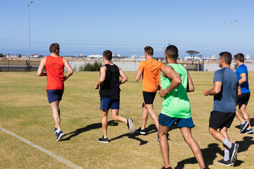 Wall Mural - Men running to train