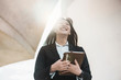 © DisobeyArt - Business asian woman going to work - Happy female entrepreneur out of the office after a startup - Tech, entrepreneur and job concept - Focus on her face
