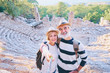 © luengo_ua - Tourism and technology. Traveling senior couple taking selfie together against ancient sightseeing background.