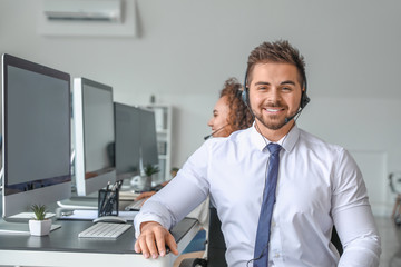 Poster - Portrait of male technical support agent in office