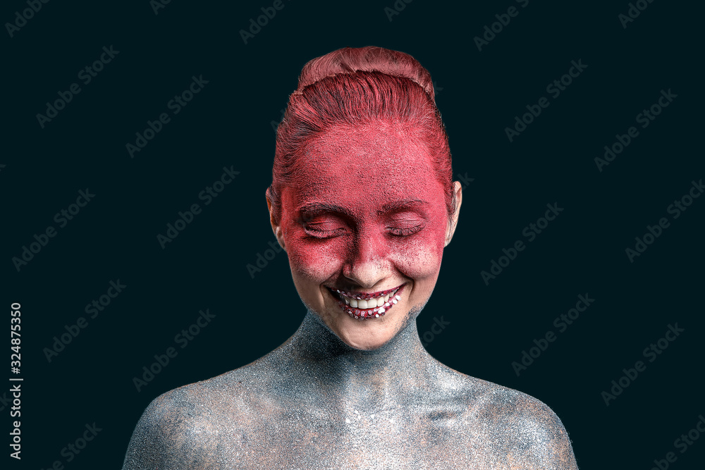 Beautiful woman with unusual makeup on dark background
