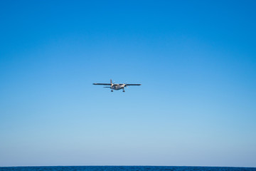 small sea plane above the sea