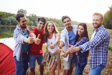 Wall Mural - Group of people smiling standing on a picnic