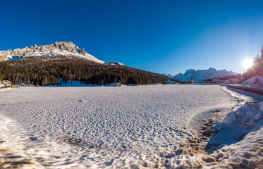 The view of the frozen lake Misurina and Dolomites, Italy