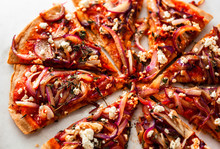 Directly Above View Of Sliced Pizza With Grilled Red Onions And Feta