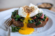 © Andrew Scrivani - Selective focus of bruschetta topped with poached egg
