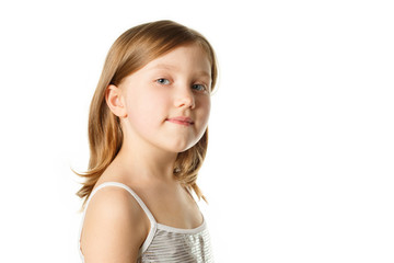 Girl on a white background looks at the camera