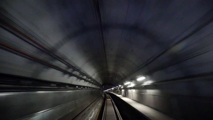 Canvas Print - Video of train moving fast in subway tunnel in Sydney, Australia, motion blur