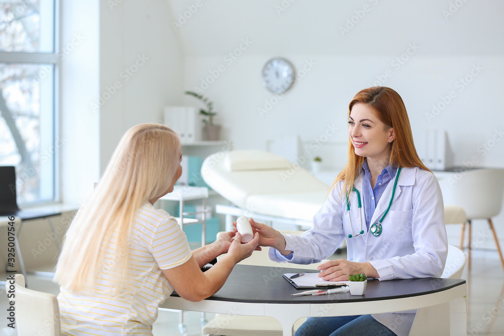 Mature woman visiting doctor in clinic