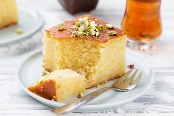 Revani - sweet semolina cake with pistachio, traditional turkish dessert