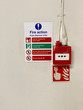 © Richard Johnson - Fire action plan sign and manual fire alarm point in public work place