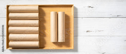 Fotografía Some moxa sticks are in rectangular wooden trays