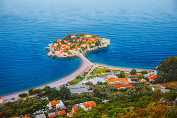Fototapete - Aerial view of the small islet Sveti Stefan. Location Montenegro, Adriatic sea, Europe.