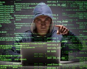 young hacker in data security concept