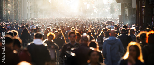 Blurred crowd of unrecognizable at the street Wallpaper Mural