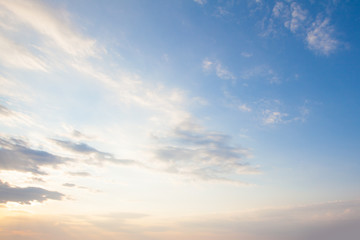 Wall Mural - blue sky clouds background. beautiful landscape with clouds and orange sun on sky