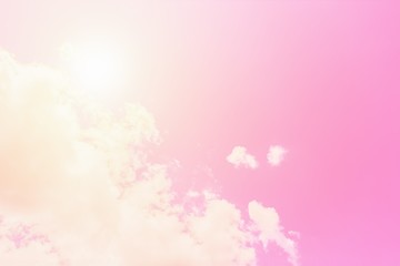 Wall Mural - Sunny pink sky background. Beautiful warm sky with clouds. Toned photo