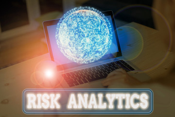 Poster - Writing note showing Risk Analytics. Business concept for study of underlying uncertainty of a given course of action Elements of this image furnished by NASA