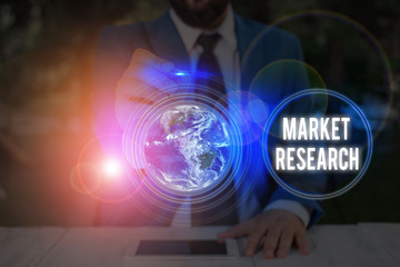 Poster - Writing note showing Market Research. Business concept for gathering information about consumers needs and preferences Elements of this image furnished by NASA