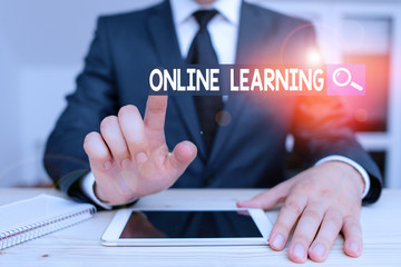 Poster - Writing note showing Online Learning. Business concept for educational tool based on and accessible from the Internet Male human wear formal clothes present use hitech smartphone
