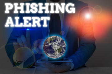 Wall Mural - Writing note showing Phishing Alert. Business concept for Be cautious to fraudulent attempt to obtain subtle facts Elements of this image furnished by NASA