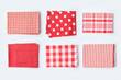 Red tablecloth or kitchen towel collection on white background. Cooking or baking mock up for design.