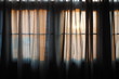 Curtain with warm sunlight behind the dark room For cozy home and decoration Living and lifestyle concept