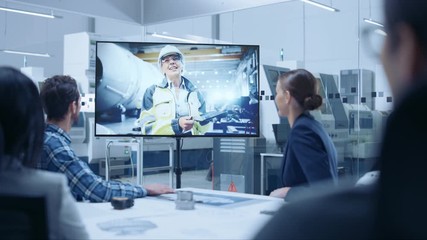 Poster - Diverse Group of Specialists, Managers in the Factory Office Meeting Room, Have Conference Video Call with Factory Chief Female Engineer, She Talks about Production Growth, Uses Tablet Computer