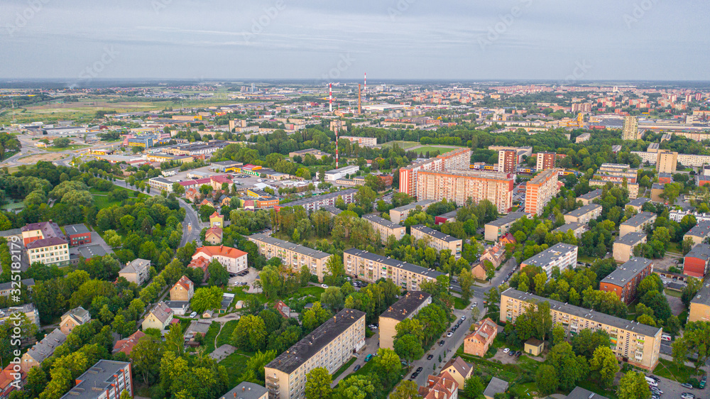 Beautiful panoramic Aerial view photo from flying drone on Klaipeda city center on a summer evening at sunset. Klaipeda, Lithuania (series) - obrazy, fototapety, plakaty 