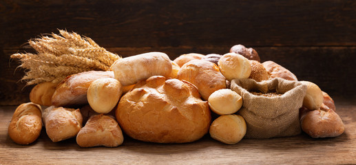 Wall Mural - Fresh baked bread and wheat ears