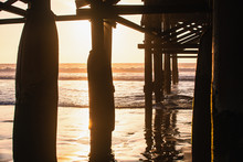 Under The Pier At Sunset