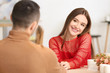 © Pixel-Shot - Happy young couple on romantic date in cafe