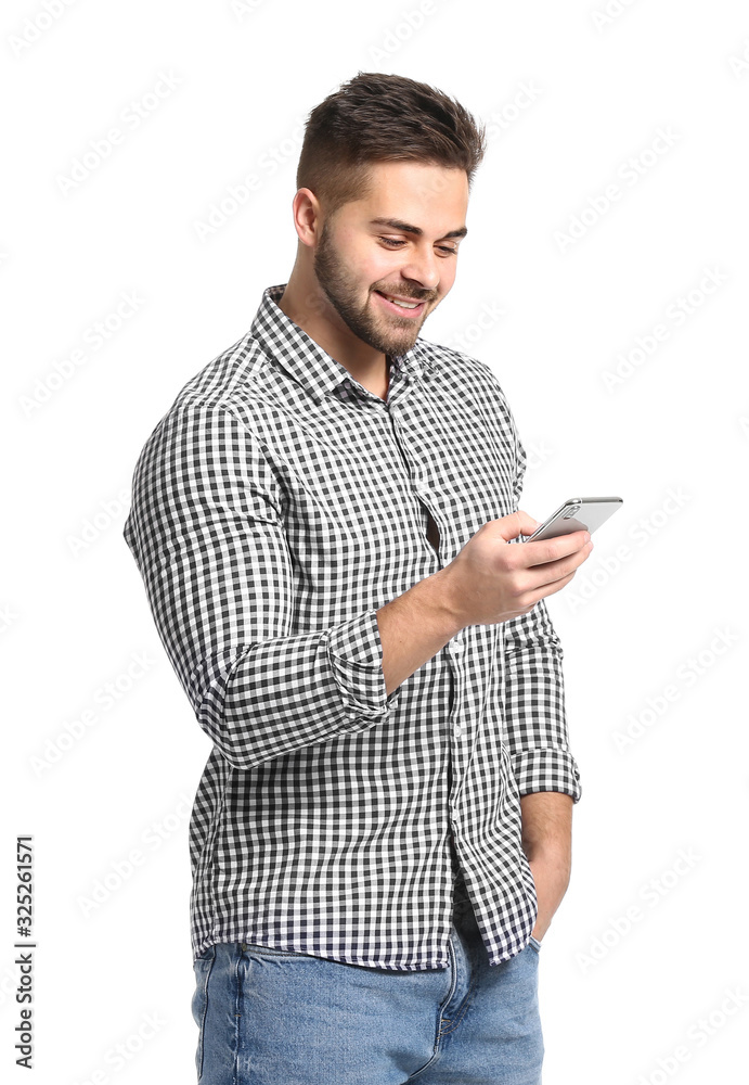 Young man with mobile phone on white background