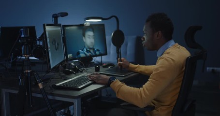 Graphic designers discussing via a video call