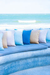 Pillow on chair or sofa lounge around outdoor patio with sea ocean beach view