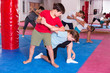 © JackF - Kids exercising self-defense movements