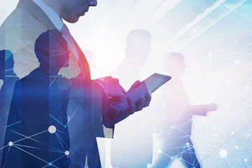 Poster - Businessman with tablet in smart city