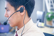 © Pataradon - Young customer service men agent with headsets and computer working at office.