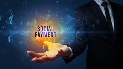 Elegant hand holding SOCIAL PAYMENT inscription, social networking concept