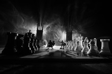 Chess Board Game Concept Of Business Ideas And Competition And Strategy Ideas Chess Figures On A Dark Background With Smoke And Fog.