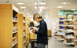 © lado2016 - Man shopping in supermarket, reading product information