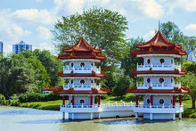 Two Traditional Chinese-style Pagodas On The Shore Of A Lake Located In The Chinese Garden In Singapore