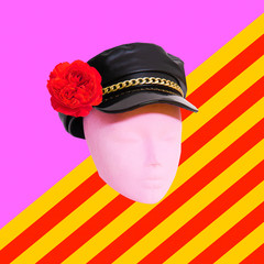 Contemporary art collage. Mannequin in fashion black cap with flowers. Stylish accessories concept