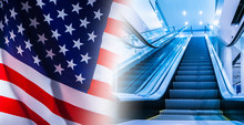 New Opportunities In The US. Career Ladder. Career In America. American Dream. Rising Escalator On The Background Of The Flag Of The United States Of America.