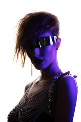 Colorful portrait of a young woman wearing futuristic glasses