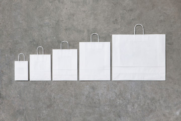 Wall Mural - white paper bags of different sizes